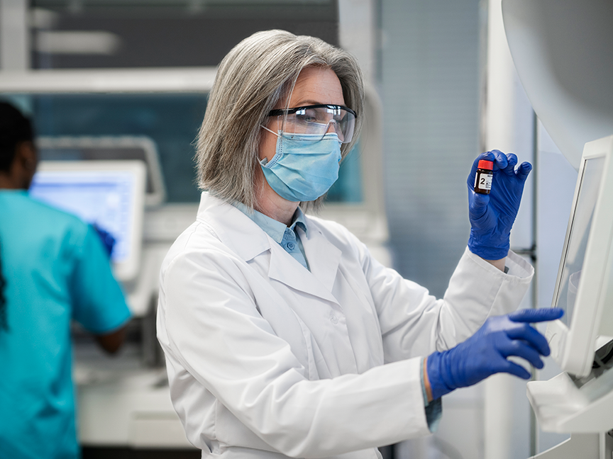 Doctor perfporming research 